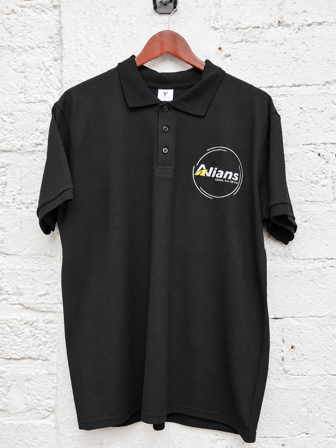 Polo negro Yazbek con estampado DTF Alians Carga